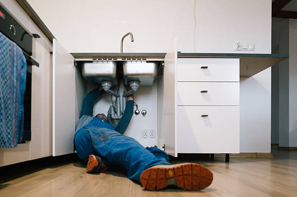 Professional Emergency Plumber technician working in Shipman, IL